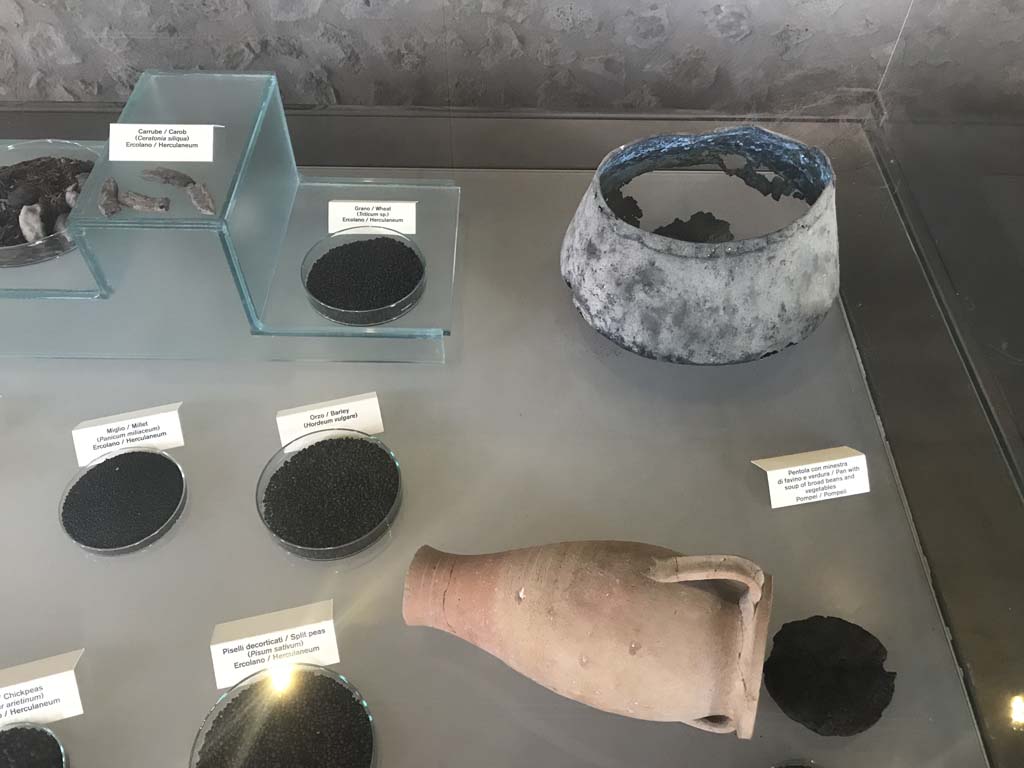 Foodstuffs, April 2019. Photo courtesy of Rick Bauer.
Carob, Wheat (Grano), Millet (Miglio), Barley (Orzo), Chickpeas, Split Peas (piselli decorticate) all from Herculaneum.